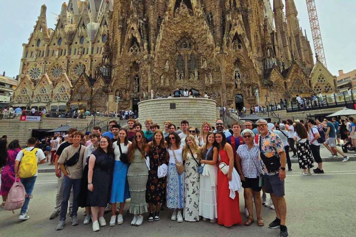 Students and faculty pose for a photo in Barcelona before the La Sagrada Familia cathedral. As part of the international summer program through the Thomas Walter Center, students can spend four weeks in Spain and another four weeks in Germany, learning a blend of business and engineering principles for international product design.