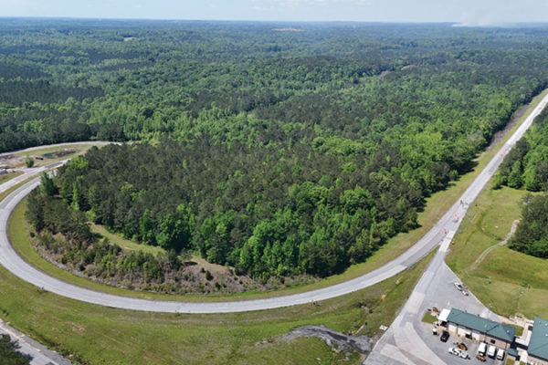 Test Track construction began in 1999 with a thick asphalt base and permeable
foundation, and early planning efforts — including guidance from former Test Track
Associate Director Buzz Powell in 2000 — helped shape the layout still in use today.