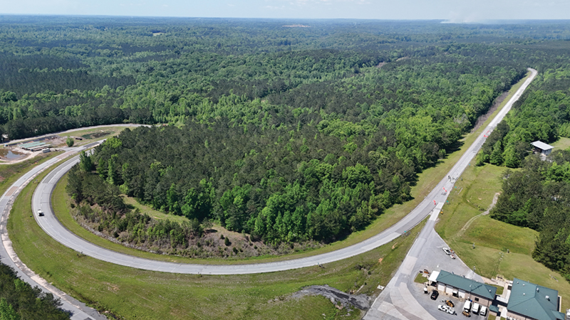 Test Track construction began in 1999 with a thick asphalt base and permeable
foundation, and early planning efforts — including guidance from former Test Track
Associate Director Buzz Powell in 2000 — helped shape the layout still in use today.
