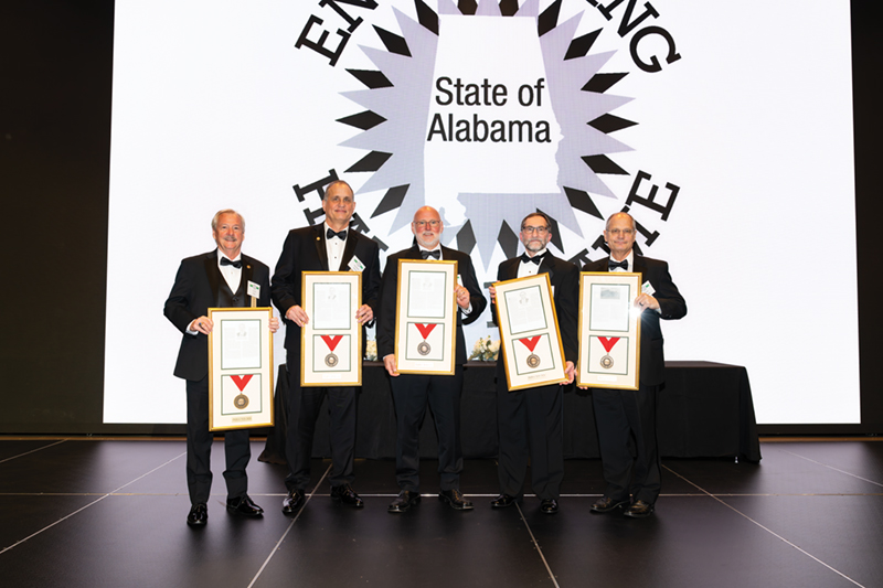 Class of 2026 inductees associated with the university included (L-R) Lloyd Pitts, ’83 civil engineering; Jonathan Pettus, executive director of the Auburn University Applied Research Institute; Keith Jones, ’84 chemical engineering and ’86 electrical engineering; Barry Pike, ’83 and ’85 chemical engineering; and Glenn Rolader, president, CEO and co-founder of Integrated Solutions for Systems Inc. (IS4S), a company headquartered in Huntsville with satellite offices in Auburn and Opelika, which was selected in the corporation category.