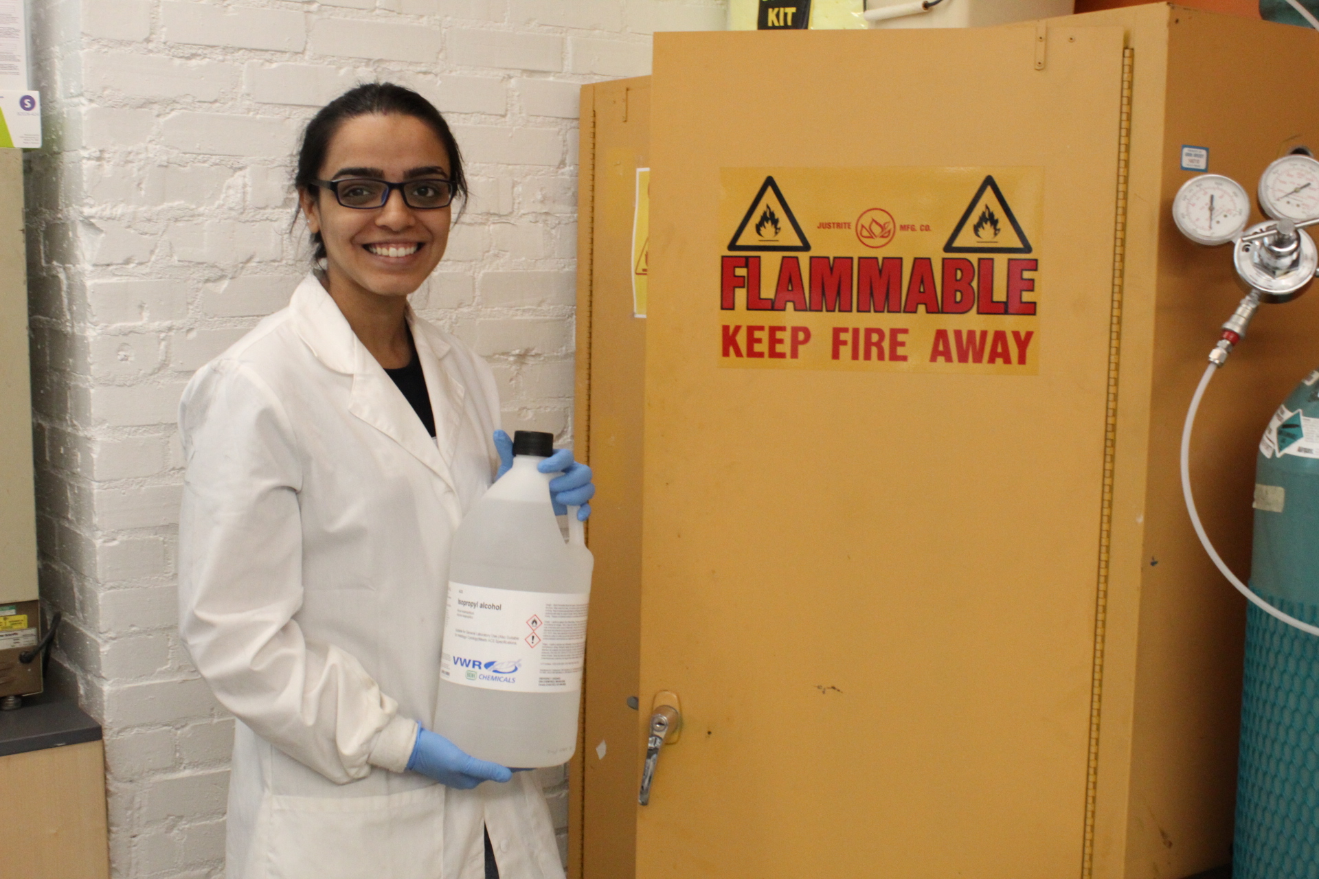 student holding flammable object 