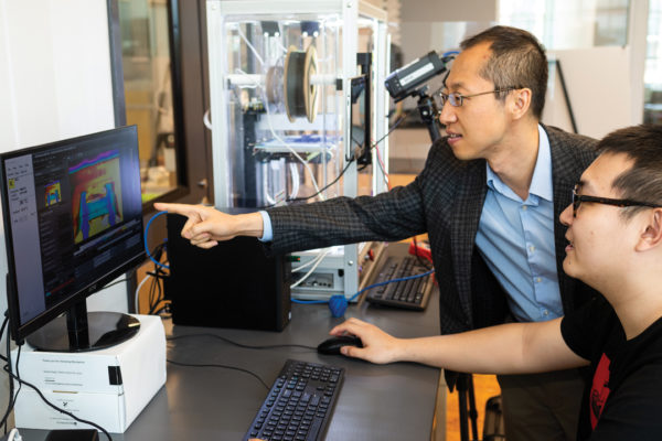 Peter Liu, left, received an NSF CAREER award to support his research into deep learning's application in predicting fatigue performance in additive manufacturing.